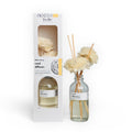 A Lilikoi Citrus Reed Diffuser featuring a clear 4oz glass bottle, natural wood flower reeds, and traditional diffuser sticks against a tropical, clean background.